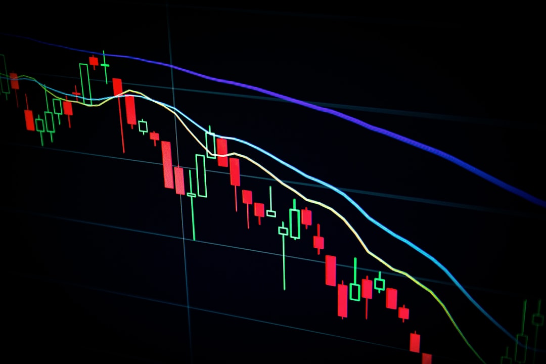 Photo by Maxim Hopman stock market candlestick chart on dark screen